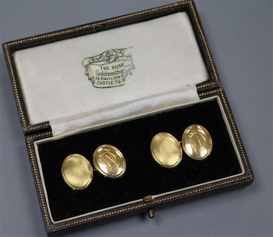 A pair of 18ct gold oval cufflinks.